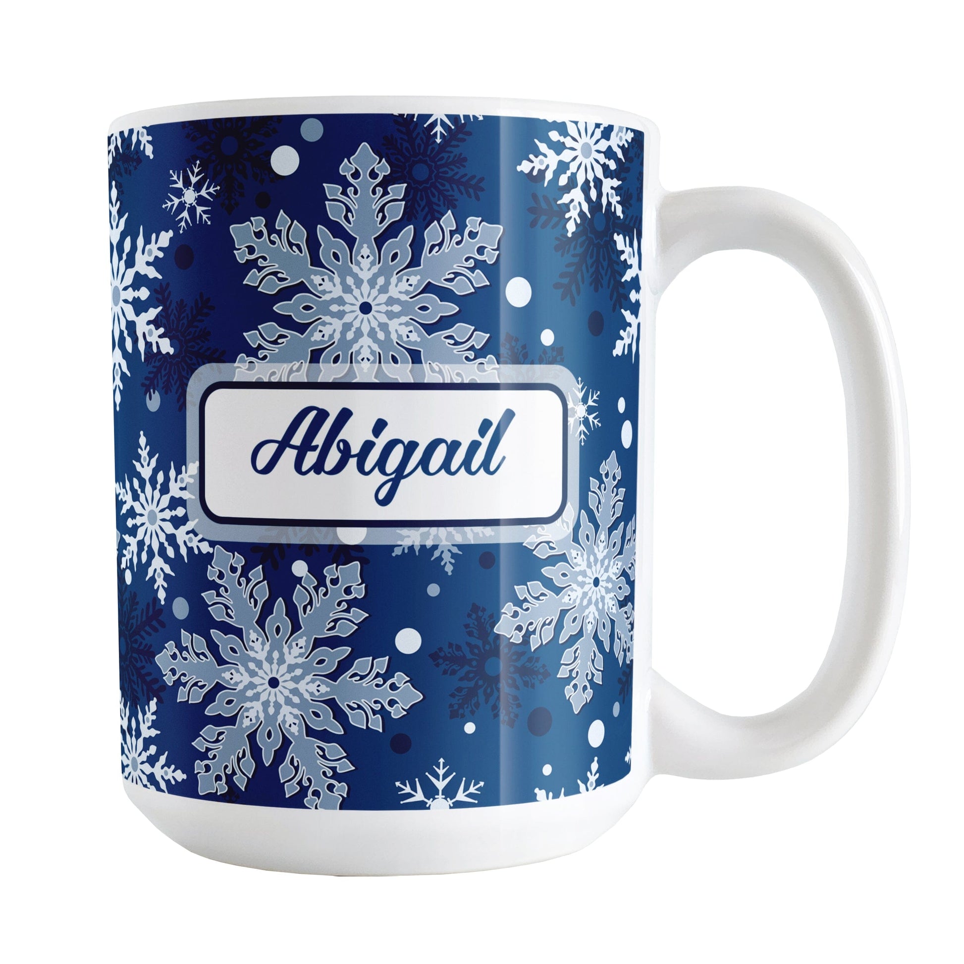 Personalized Classic Blue Snowflake Winter Mug (15oz) at Amy's Coffee Mugs. A ceramic coffee mug designed with a pattern of different shades of blue snowflakes over a classic blue background color that wraps around the mug to the handle. Your name is custom printed in a blue script font on both sides of the mug.