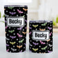 Personalized Colorful Bats Tumbler Cup (20oz or 10oz) at Amy's Coffee Mugs. A tumbler cup designed with different colored bats and white stars in an assorted pattern over a black background color that wraps around the cup. Your personalized name is custom-printed in black within a white rectangular frame design over the colorful bats background. Photo shows both sized cups on a table next to each other.