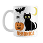 Personalized Cute Black Cat Halloween Mug (11oz) at Amy's Coffee Mugs. A ceramic coffee mug designed with a cute black cat with an orange jack o'lantern beside it, along with a crescent moon, a bat, a spider, and spider webs. Your name is custom-printed in orange below the black cat and carved pumpkin. This cute Halloween design and personalization are on both sides of the mug.