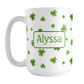 Personalized Dainty Shamrocks and Clovers Mug (15oz) at Amy's Coffee Mugs. A ceramic coffee mug designed with a print of hand-drawn green shamrocks and 4-leaf clovers in a dainty minimalist pattern that wraps around the mug up to the handle. Your personalized name is custom-printed on both sides of the mug in green.