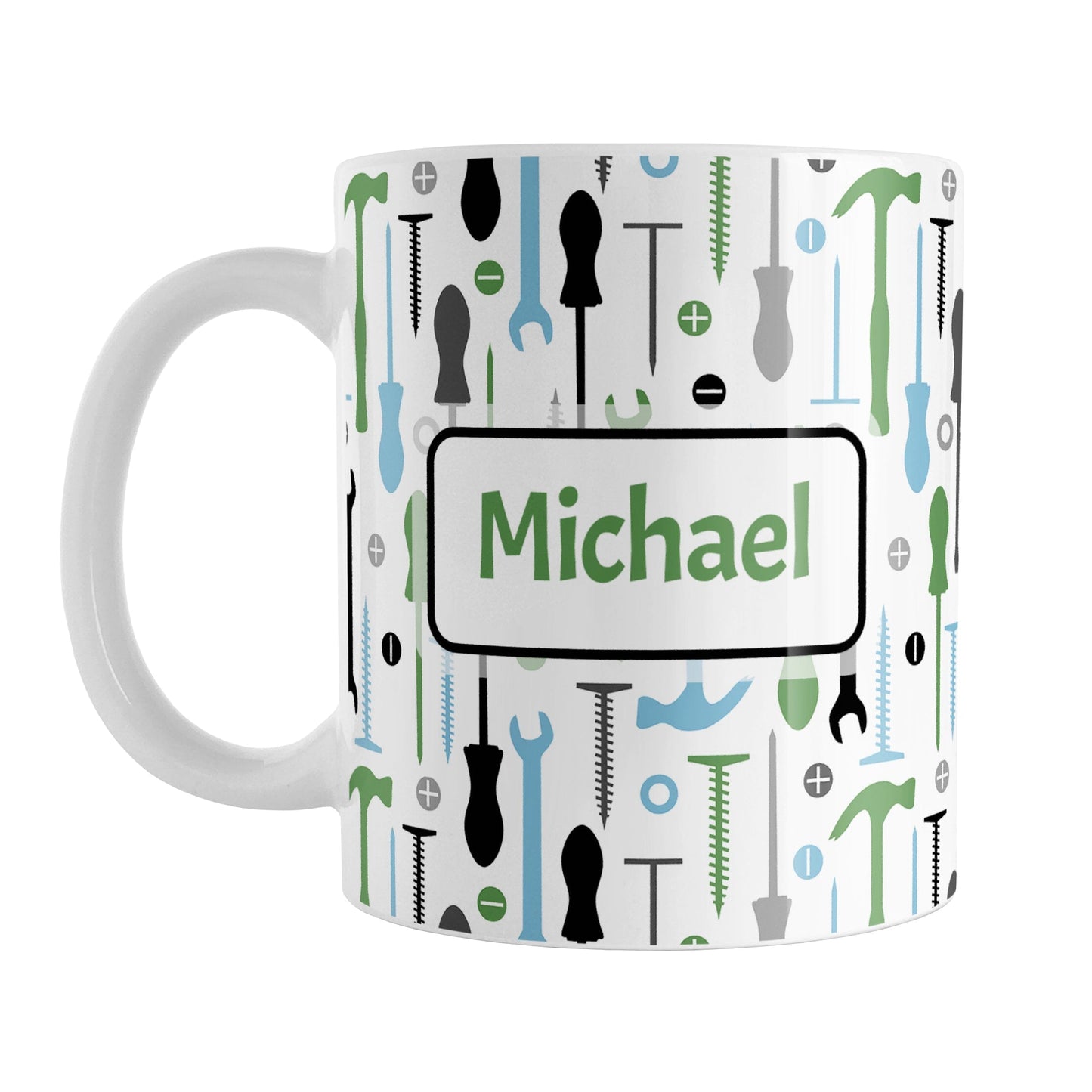 Personalized Green Blue Tools Pattern Mug (11oz) at Amy's Coffee Mugs. A ceramic coffee mug with a modern style pattern of tools in green, blue, black, and gray over white that wraps around the mug to the handle. Perfect for any handyman or contractor.  Your name is printed in a green font on both sides of the mug over the tools pattern. 