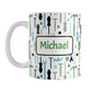 Personalized Green Blue Tools Pattern Mug (11oz) at Amy's Coffee Mugs. A ceramic coffee mug with a modern style pattern of tools in green, blue, black, and gray over white that wraps around the mug to the handle. Perfect for any handyman or contractor.  Your name is printed in a green font on both sides of the mug over the tools pattern. 