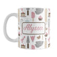 Personalized Pink Baking Pattern Mug (11oz) at Amy's Coffee Mugs. A ceramic coffee mug designed with a pattern of baking tools like spatulas, whisks, mixers, bowls, and spoons, with cookies, cupcakes, and cake all in a pink, gray, brown, and beige color scheme that wraps around the mug. Your name is printed in a pink script font on both sides of the mug over the cute baking pattern.