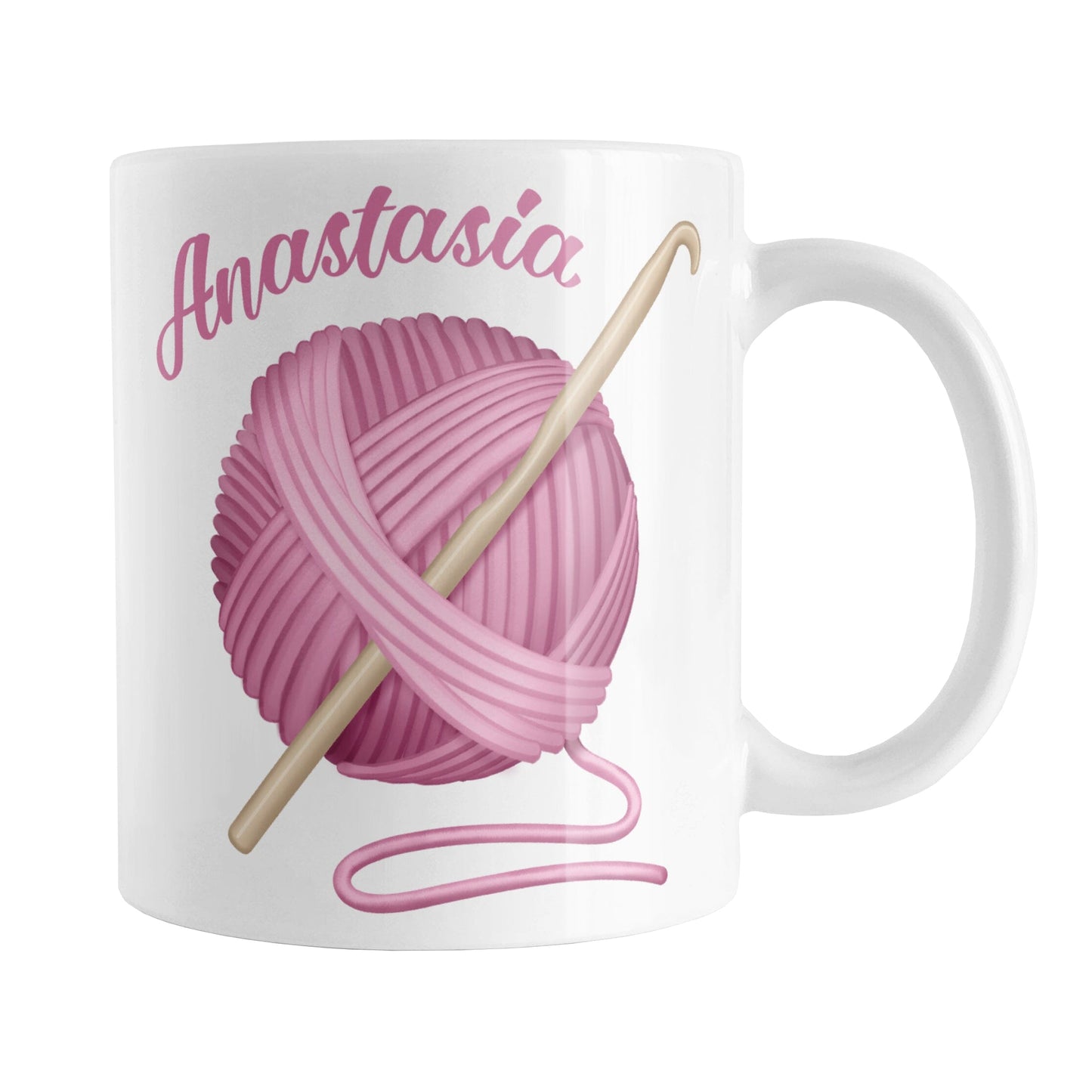 Personalized Pink Crochet Yarn Mug (11oz) at Amy's Coffee Mugs. A ceramic coffee mug designed with a large ball of pink yarn with a crochet hook through it. Your personalized name is printed in a pink script font curved along the top left edge of the ball of yarn. 