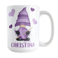 Personalized Purple Crochet Gnome Mug (15oz) at Amy's Coffee Mugs. A ceramic coffee mug designed with a cute gnome wearing a purple crochet hat while holding a ball of purple yarn and a crochet hook with purple hearts around him. Your name is printed in a fun purple font below the gnome. This adorable illustration and personalization is on both sides of the mug. 