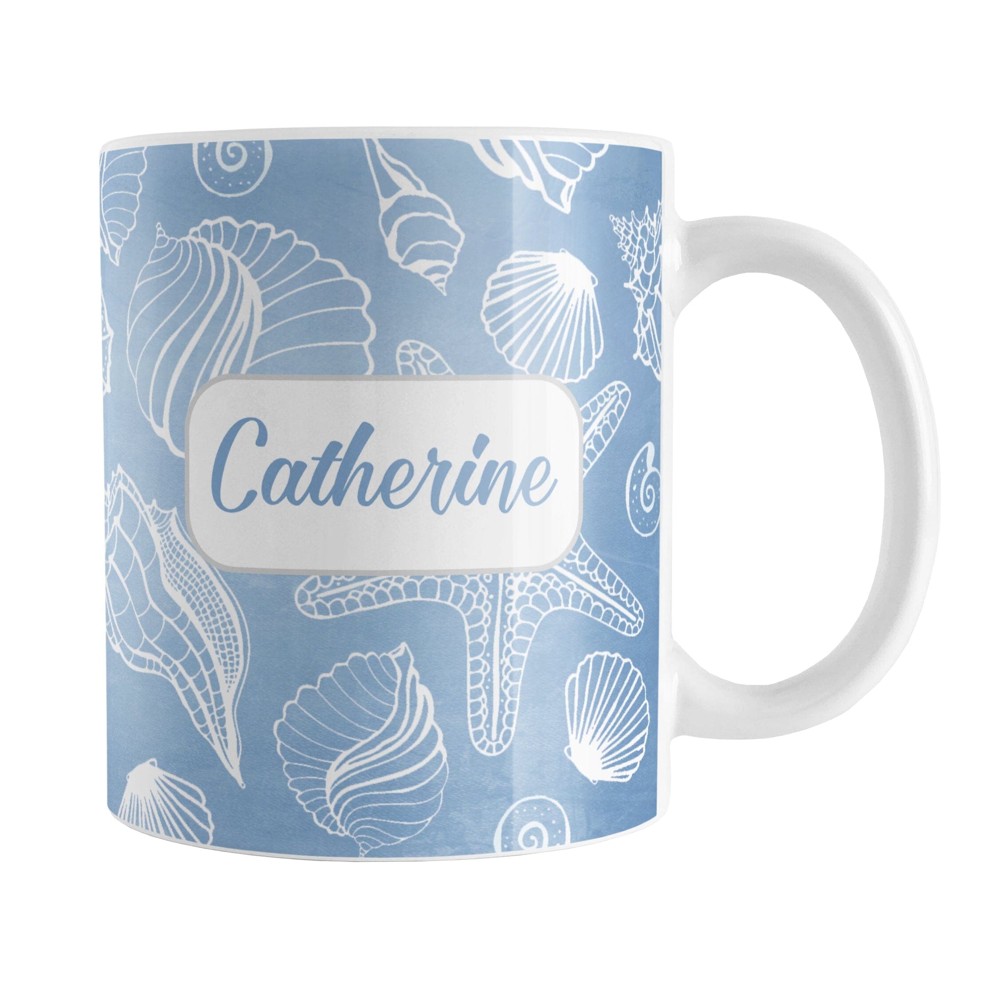 Personalized White Seashell Pattern Blue Beach Mug (11oz) at Amy's Coffee Mugs. A ceramic coffee mug designed with a white seashell line drawing pattern over a blue background that wraps around the mug up to the handle. Your name is personalized on this beach mug over the blue seashell pattern.