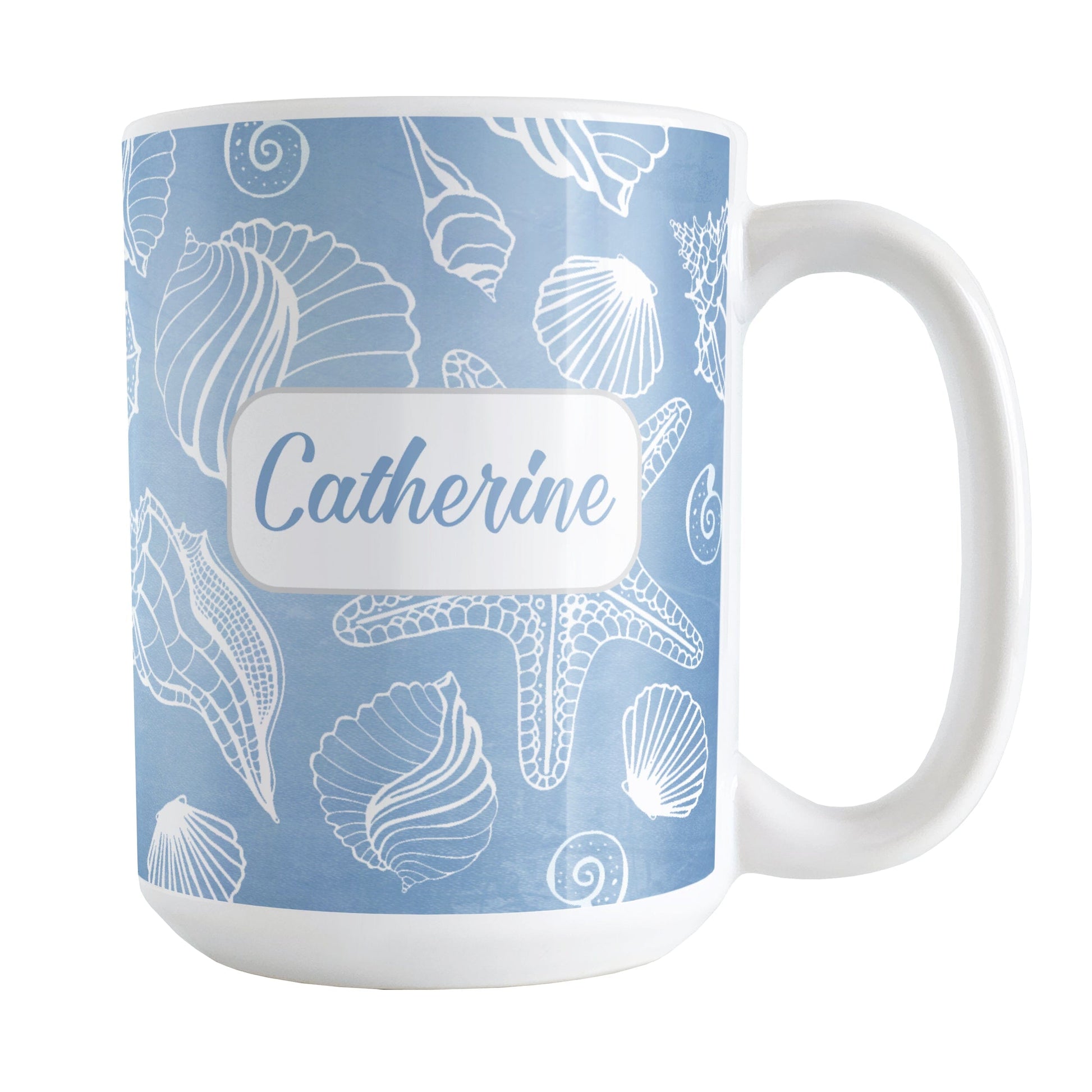 Personalized White Seashell Pattern Blue Beach Mug (15oz) at Amy's Coffee Mugs. A ceramic coffee mug designed with a white seashell line drawing pattern over a blue background that wraps around the mug up to the handle. Your name is personalized on this beach mug over the blue seashell pattern.