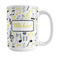 Personalized Yellow Music Notes Pattern Mug (15oz) at Amy's Coffee Mugs. A ceramic coffee mug designed with music notes and symbols in yellow, black, and gray in a pattern that wraps around the mug to the handle. Your personalized name is custom printed in a yellow script font on white over the music pattern design on both sides of the mug.