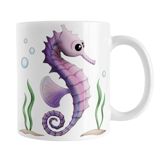 Pink and Purple Seahorse Mug (11oz) at Amy's Coffee Mugs. A ceramic coffee mug designed with an illustration of a pink and purple seahorse with seaweed and bubbles on both sides of the mug. 