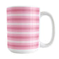 White mug with pink horizontal stripes on a white background