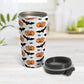 Pumpkins Bats and Spiders Halloween Travel Mug (15oz) at Amy's Coffee Mugs. A travel mug designed with a pattern of orange carved pumpkins, bats, and spiders in their webs in a pattern that wraps around the mug. Photo shows the mug open on a table with its lid beside it.