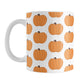 Pumpkins Mug (11oz) at Amy's Coffee Mugs. A ceramic coffee mug designed with illustrated orange pumpkins in a pattern that wraps around the mug to the handle.