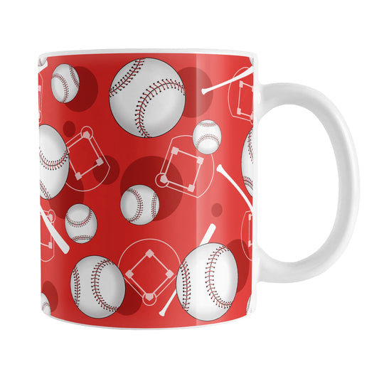 Red Baseball Pattern Mug (11oz) at Amy's Coffee Mugs. A ceramic coffee mug designed with a pattern of baseballs, baseball diamonds, baseball bats, and darker red circles over a red background color that wraps around the mug up to the handle.