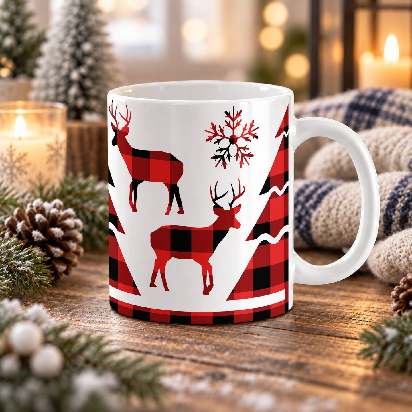 11 oz red buffalo plaid deer mug with antlered deer, evergreen trees, and snowflake details over glossy white ceramic, on a wooden table with cozy winter decor around it.