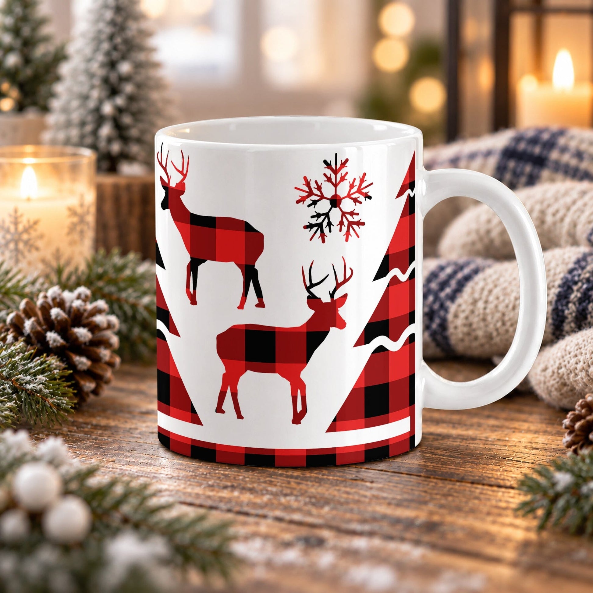 11 oz red buffalo plaid deer mug with antlered deer, evergreen trees, and snowflake details over glossy white ceramic, on a wooden table with cozy winter decor around it.