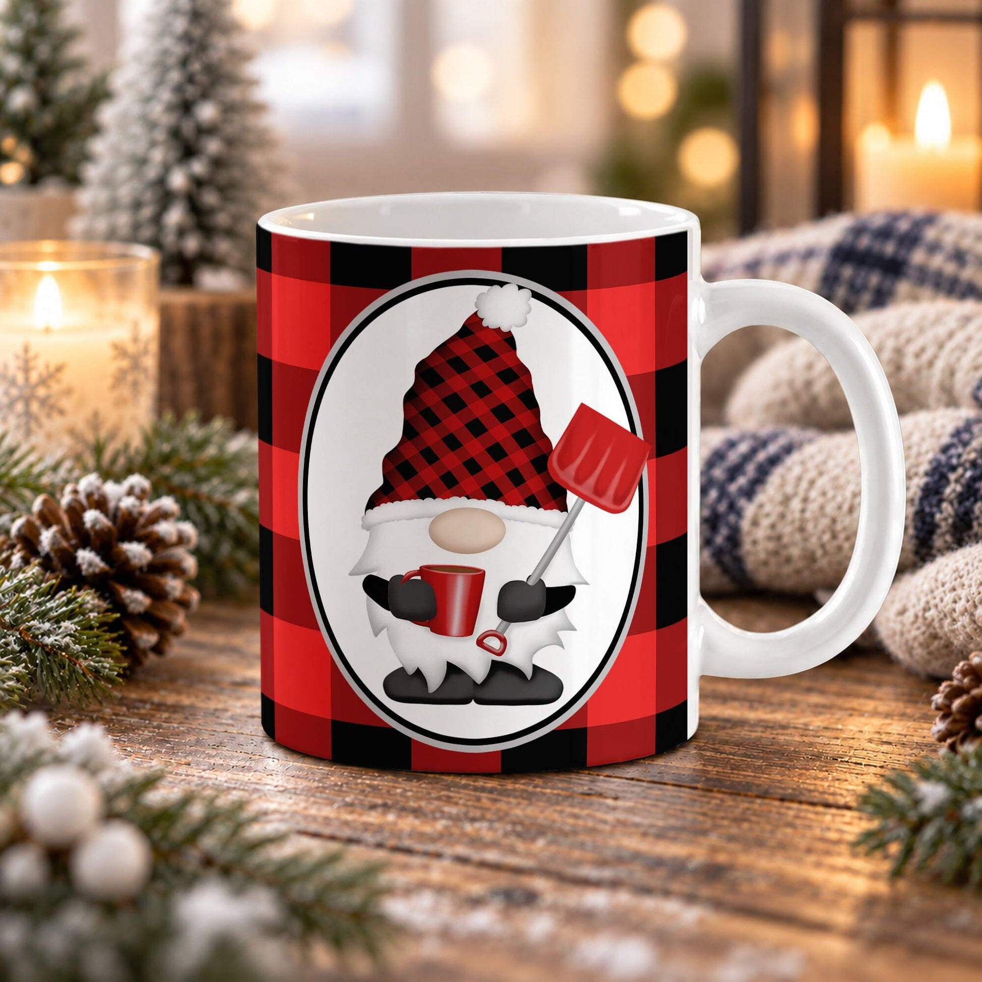 11 oz red gnome buffalo plaid mug with winter gnome holding a red mug and snow shovel inside a white oval over red and black checkered pattern, displayed on a wooden tabletop with cozy winter decor around it.