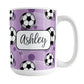 Soccer Ball and Goal Personalized Purple Soccer Mug (15oz) at Amy's Coffee Mugs. A ceramic coffee mug designed with a pattern of soccer balls and white soccer goals over a purple background with purple circles. Your personalized name is custom-printed in a fun black script font on both sides of the mug over the soccer pattern. 