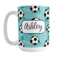 Soccer Ball and Goal Personalized Teal Soccer Mug (15oz) at Amy's Coffee Mugs. A ceramic coffee mug designed with a pattern of soccer balls and white soccer goals over a teal background with teal circles. Your personalized name is custom-printed in a fun black script font on both sides of the mug over the soccer pattern. 