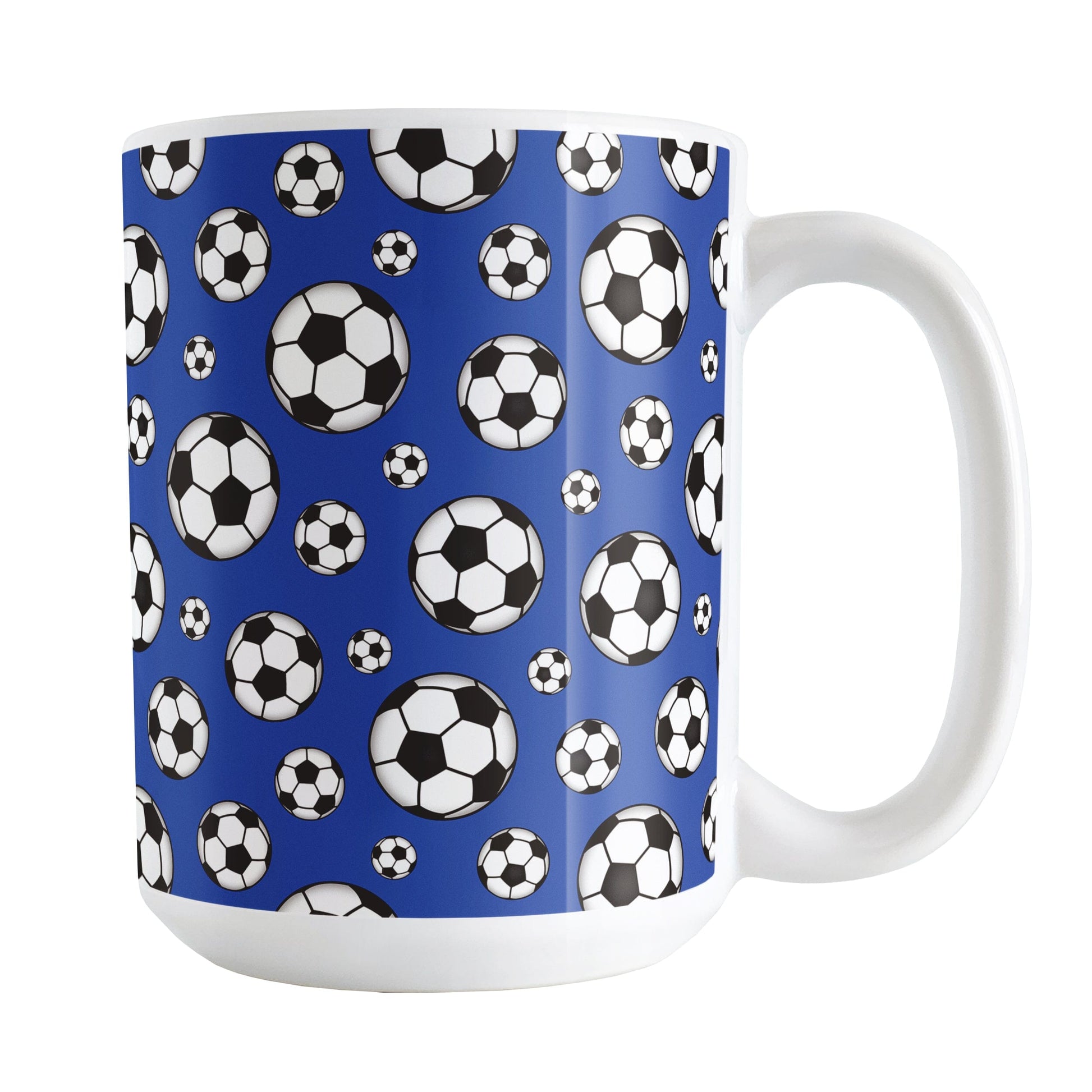 15oz white ceramic mug with a design of soccer balls over dark blue