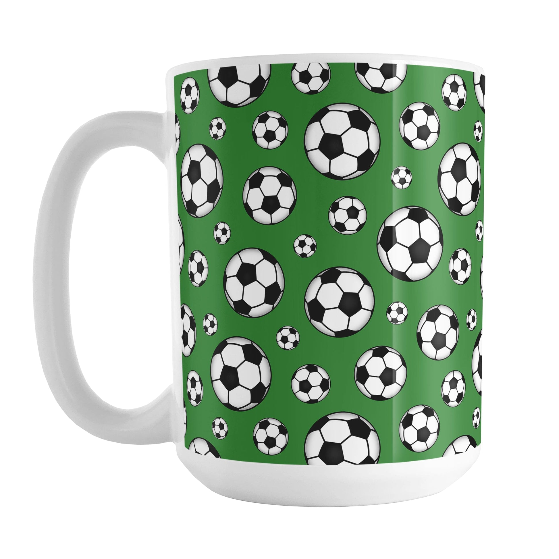 15oz white ceramic mug with a design of soccer balls over dark green