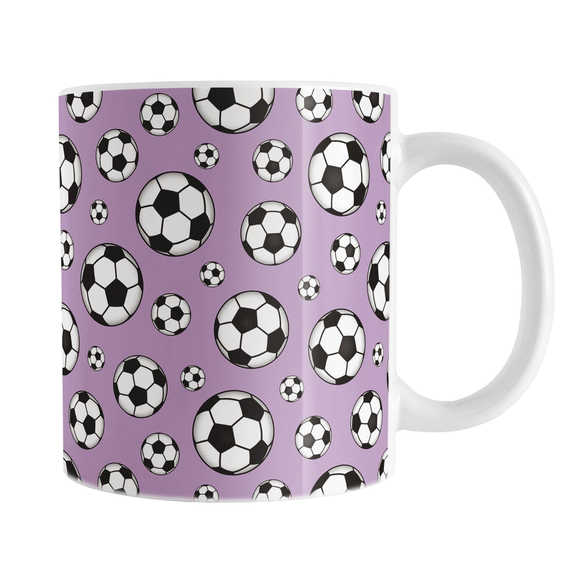 11oz white ceramic mug with a design of soccer balls over purple
