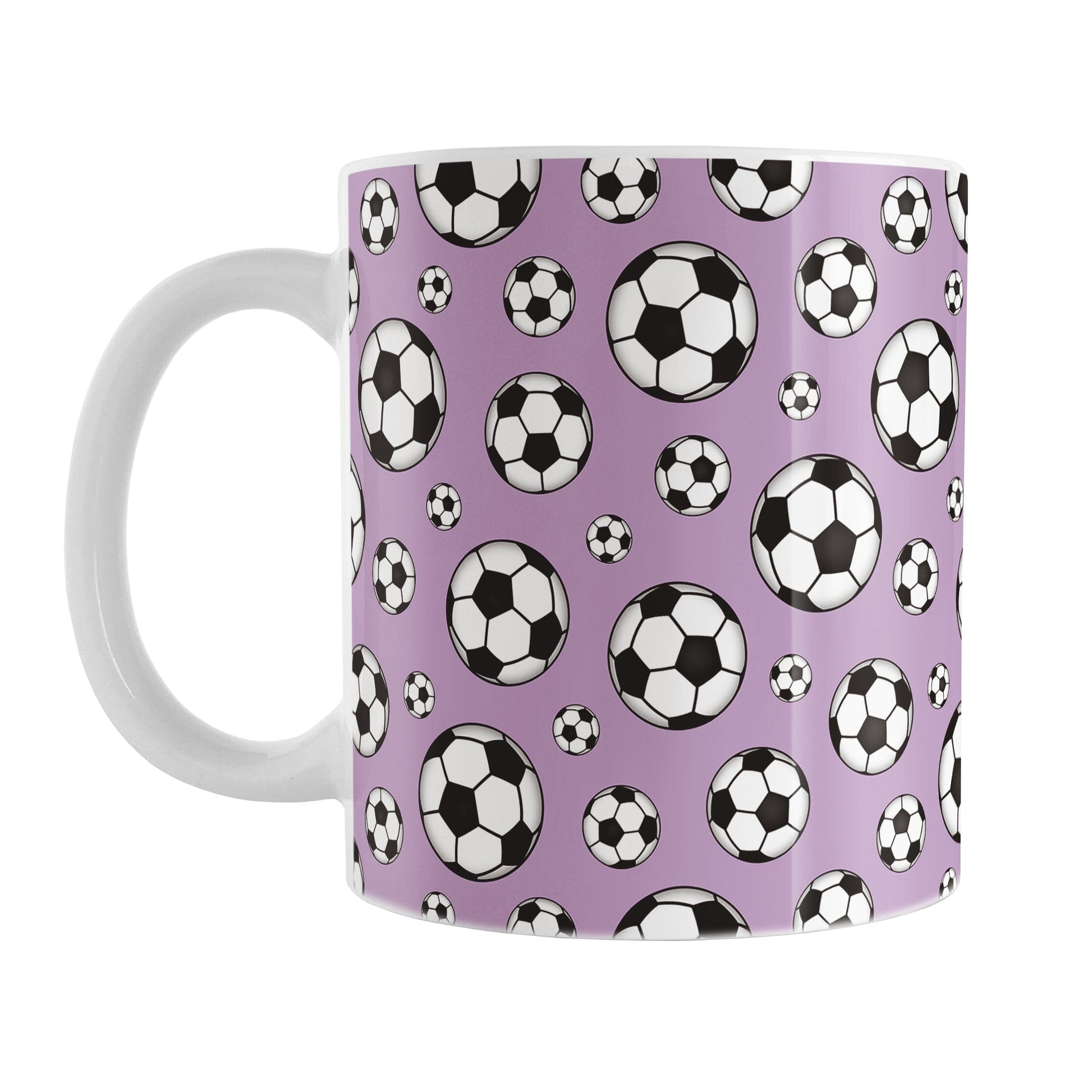 11oz white ceramic mug with a design of soccer balls over purple