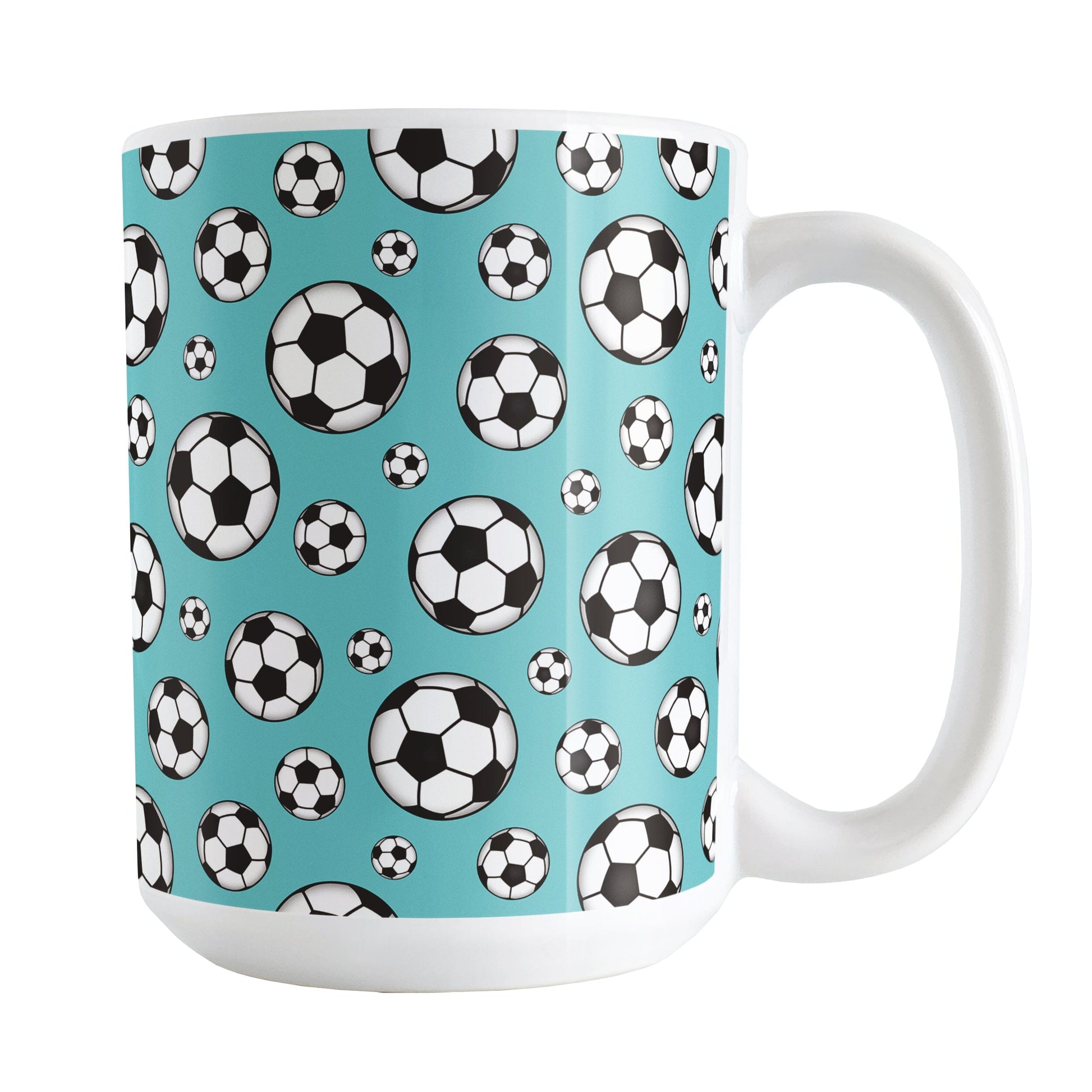 15oz white ceramic mug with a design of soccer balls over teal