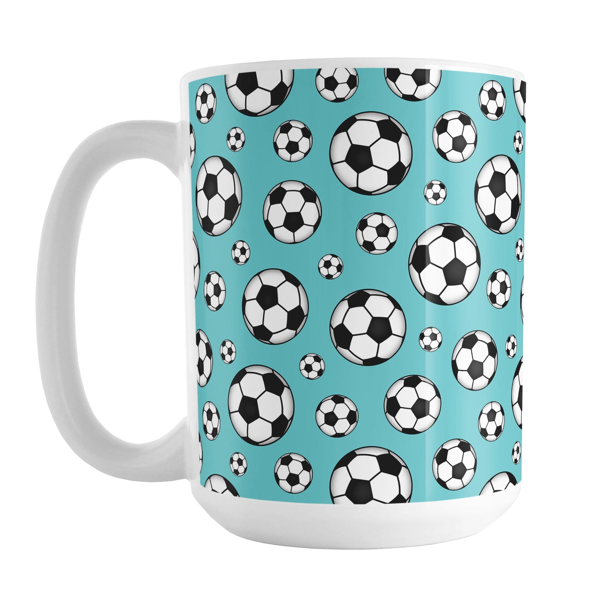 15oz white ceramic mug with a design of soccer balls over teal