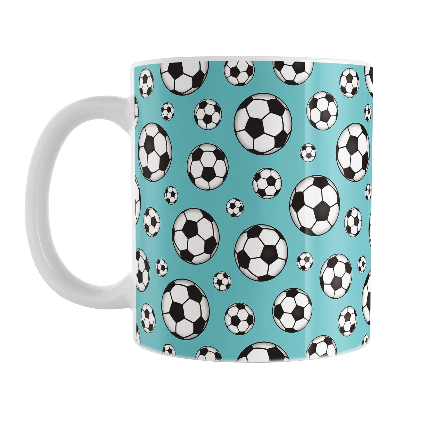 11oz white ceramic mug with a design of soccer balls over teal