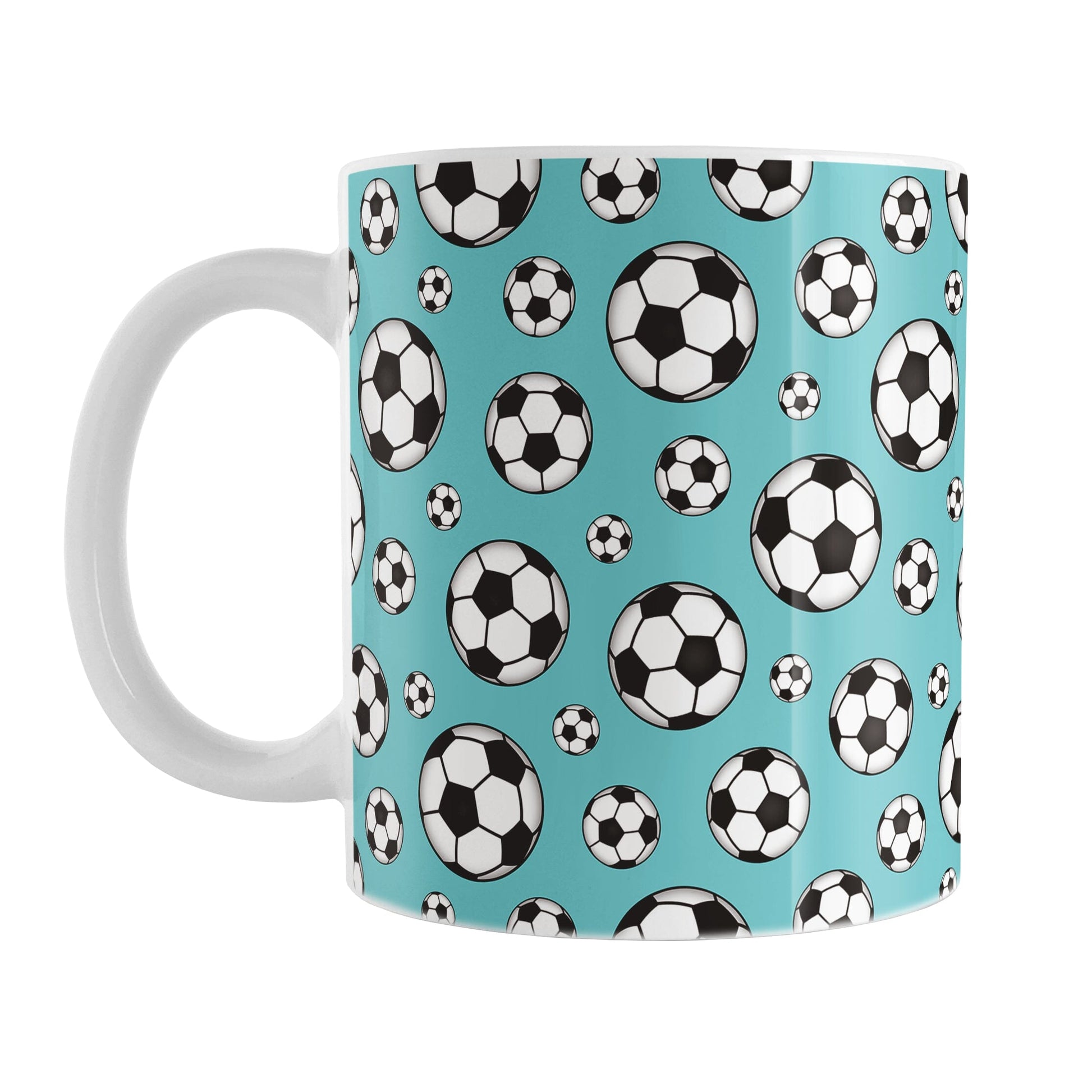 11oz white ceramic mug with a design of soccer balls over teal