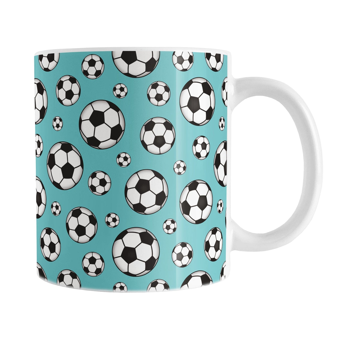 11oz white ceramic mug with a design of soccer balls over teal