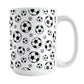 Soccer Balls Pattern Mug (15oz) at Amy's Coffee Mugs. A ceramic coffee mug designed with black and white soccer balls in varying sizes in a pattern that wraps around the mug to the handle. It's perfect for anyone who loves the game of soccer.