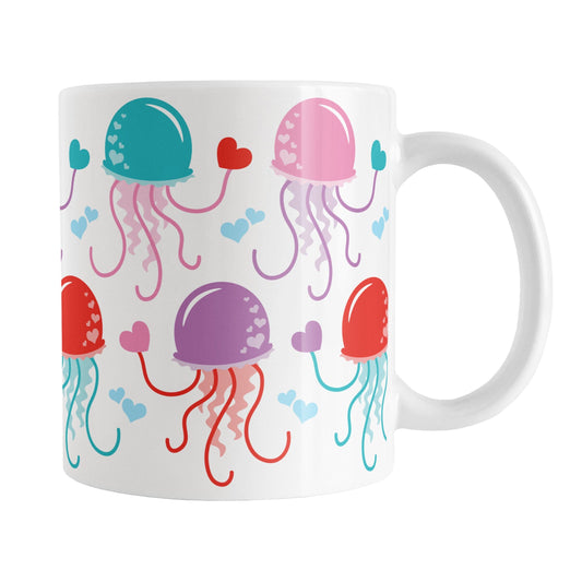 An 11oz white mug with a cute pattern of pink, purple, red, and teal jellyfish, perfect for Valentine's Day