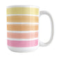 Warm Paint Strokes Mug (15oz) at Amy's Coffee Mugs. A ceramic coffee mug designed with a pattern of horizontal stripes done in a paint strokes illustration in warm colors that wraps around the mug to the handle. These warm colors include pink, peach, orange, and yellow tones.