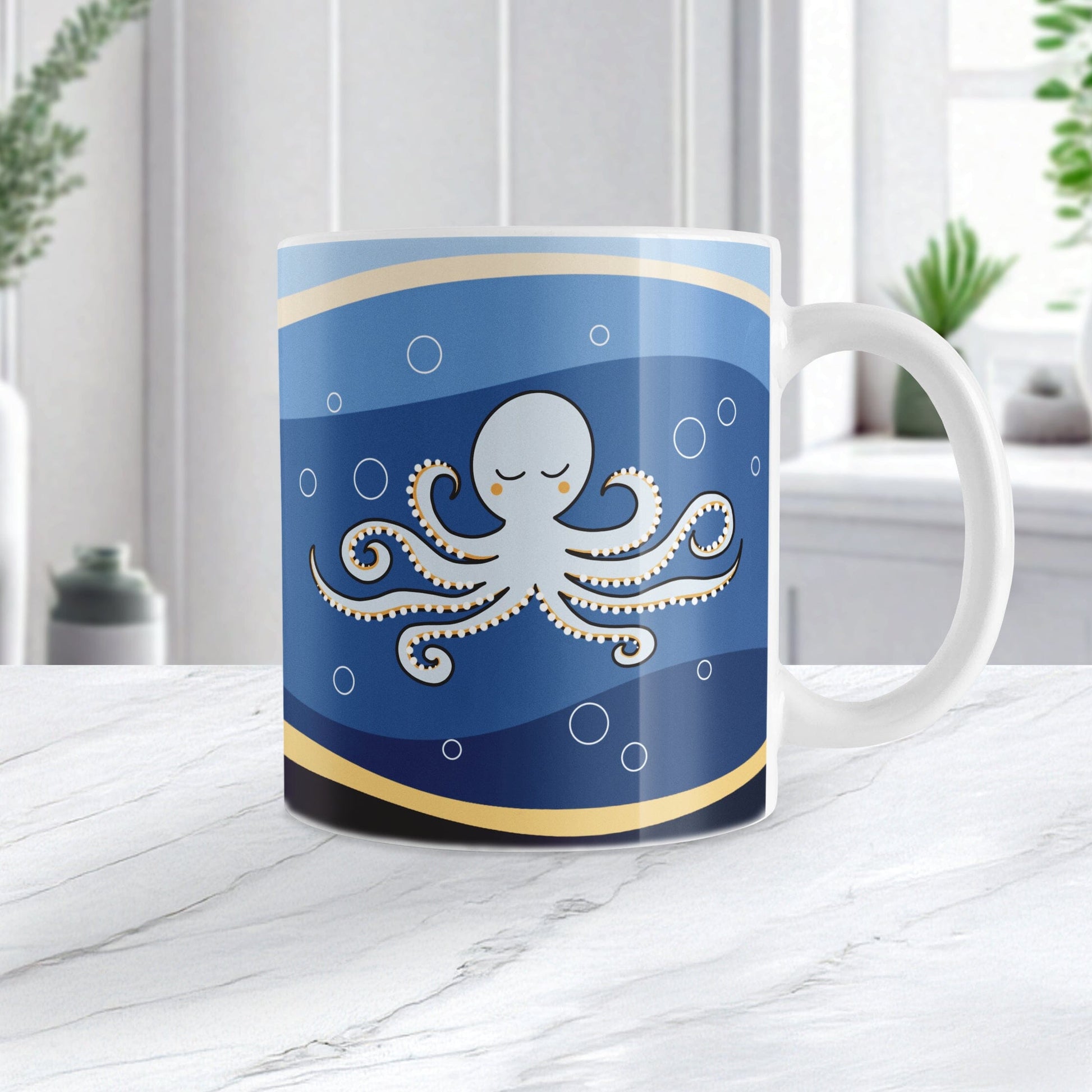 11oz white mug with an octopus over a wavy blue background design, on a marble countertop