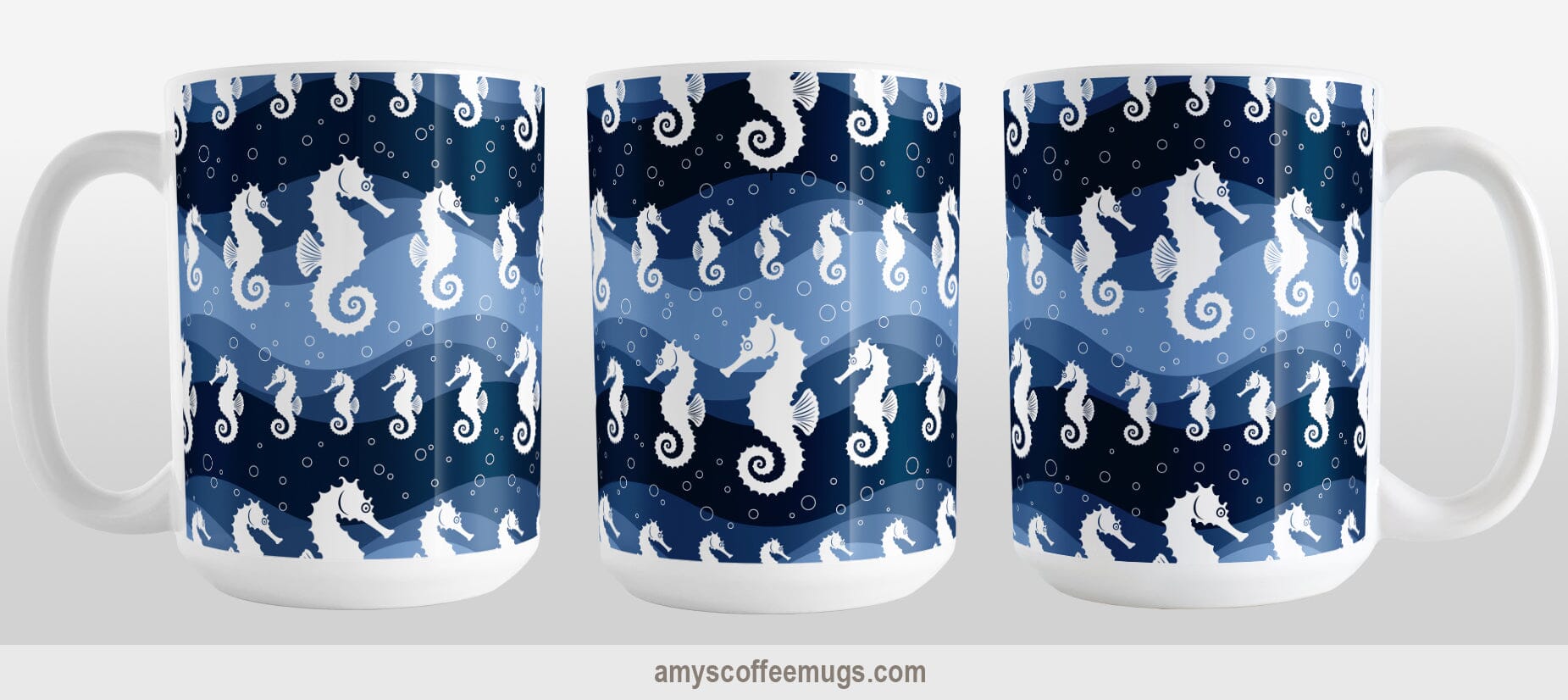 Wavy Blue Seahorse Mug (15oz) at Amy's Coffee Mugs. A ceramic coffee mug designed with white silhouette seahorses over a wavy blue background in different shades of navy blue with white circle line bubbles all in a pattern that wraps around the mug up to the handle. Image shows three views of the mug to display the entire design.