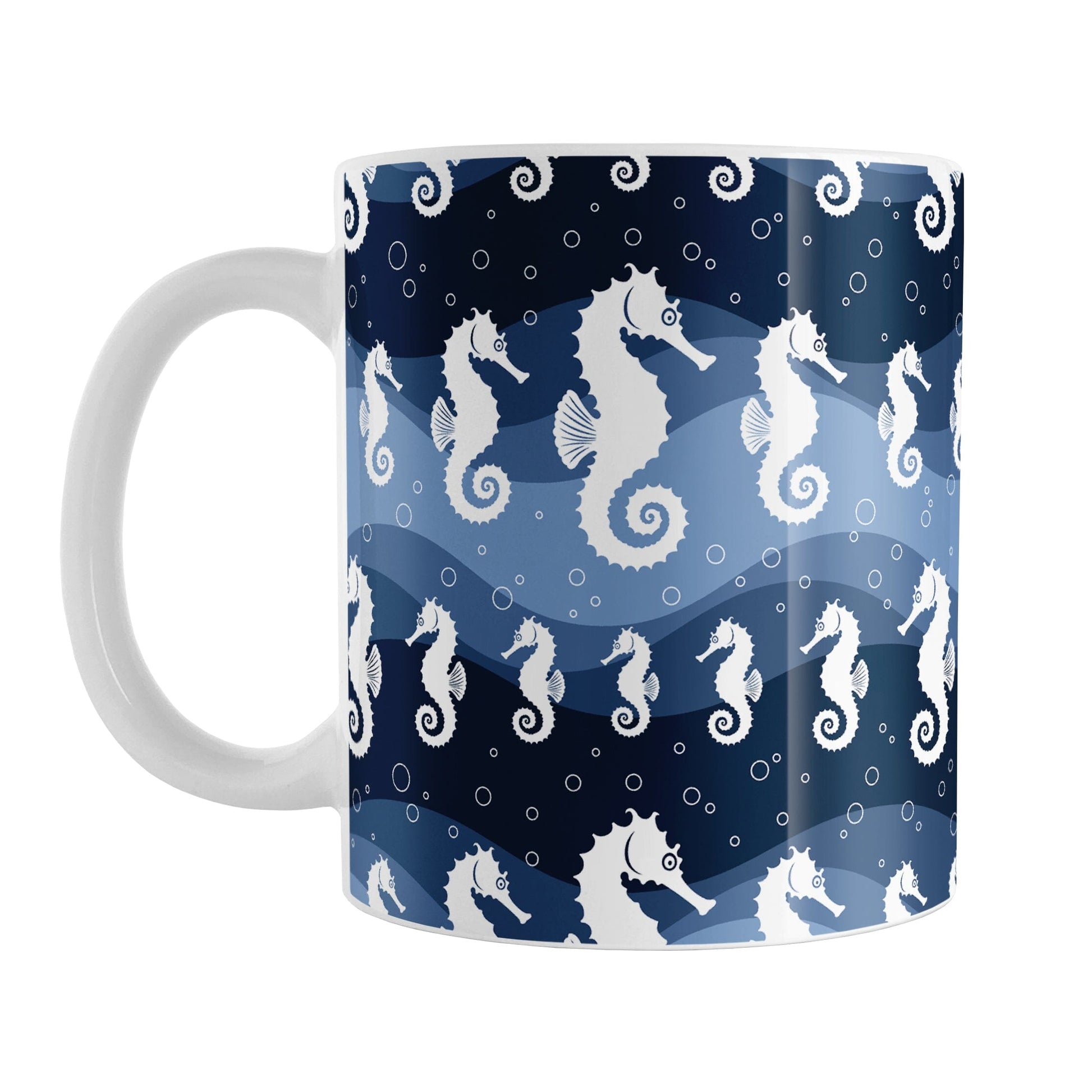 Wavy Blue Seahorse Mug (11oz) at Amy's Coffee Mugs. A ceramic coffee mug designed with white silhouette seahorses over a wavy blue background in different shades of navy blue with white circle line bubbles all in a pattern that wraps around the mug up to the handle.