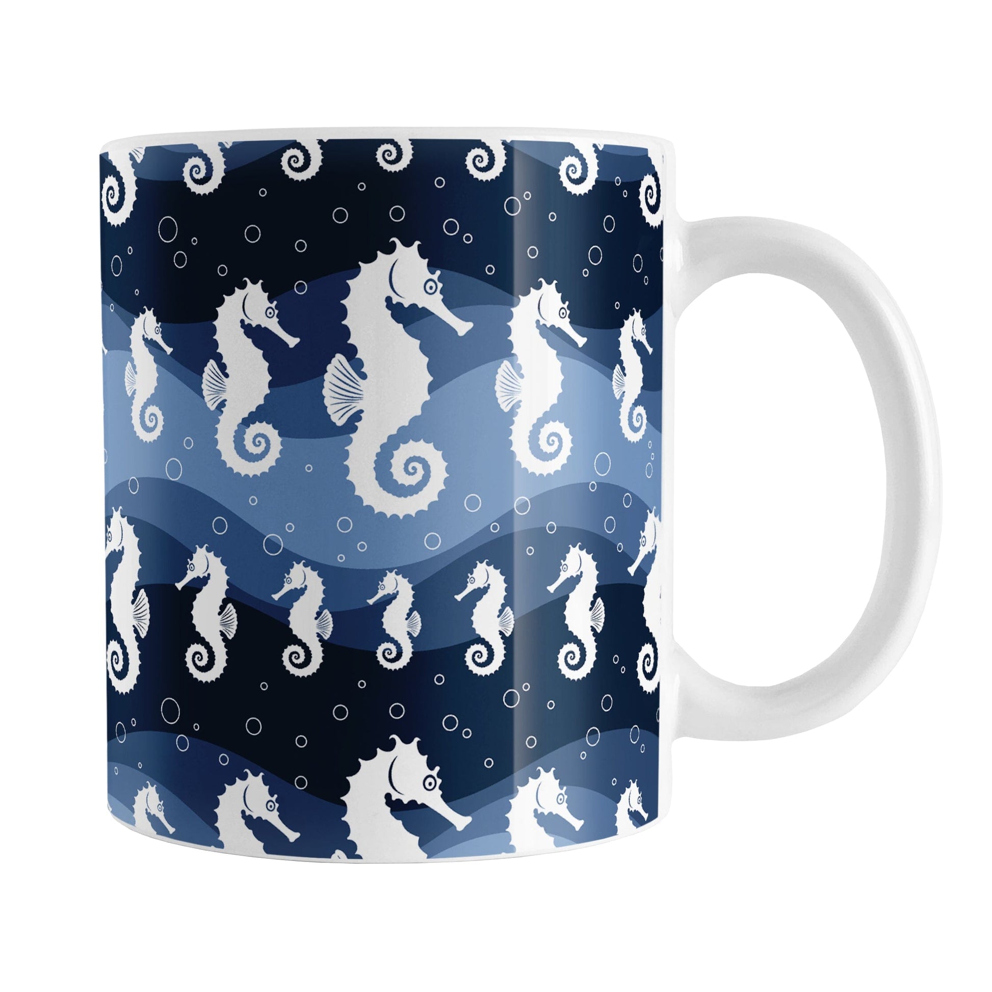 Wavy Blue Seahorse Mug (11oz) at Amy's Coffee Mugs. A ceramic coffee mug designed with white silhouette seahorses over a wavy blue background in different shades of navy blue with white circle line bubbles all in a pattern that wraps around the mug up to the handle.