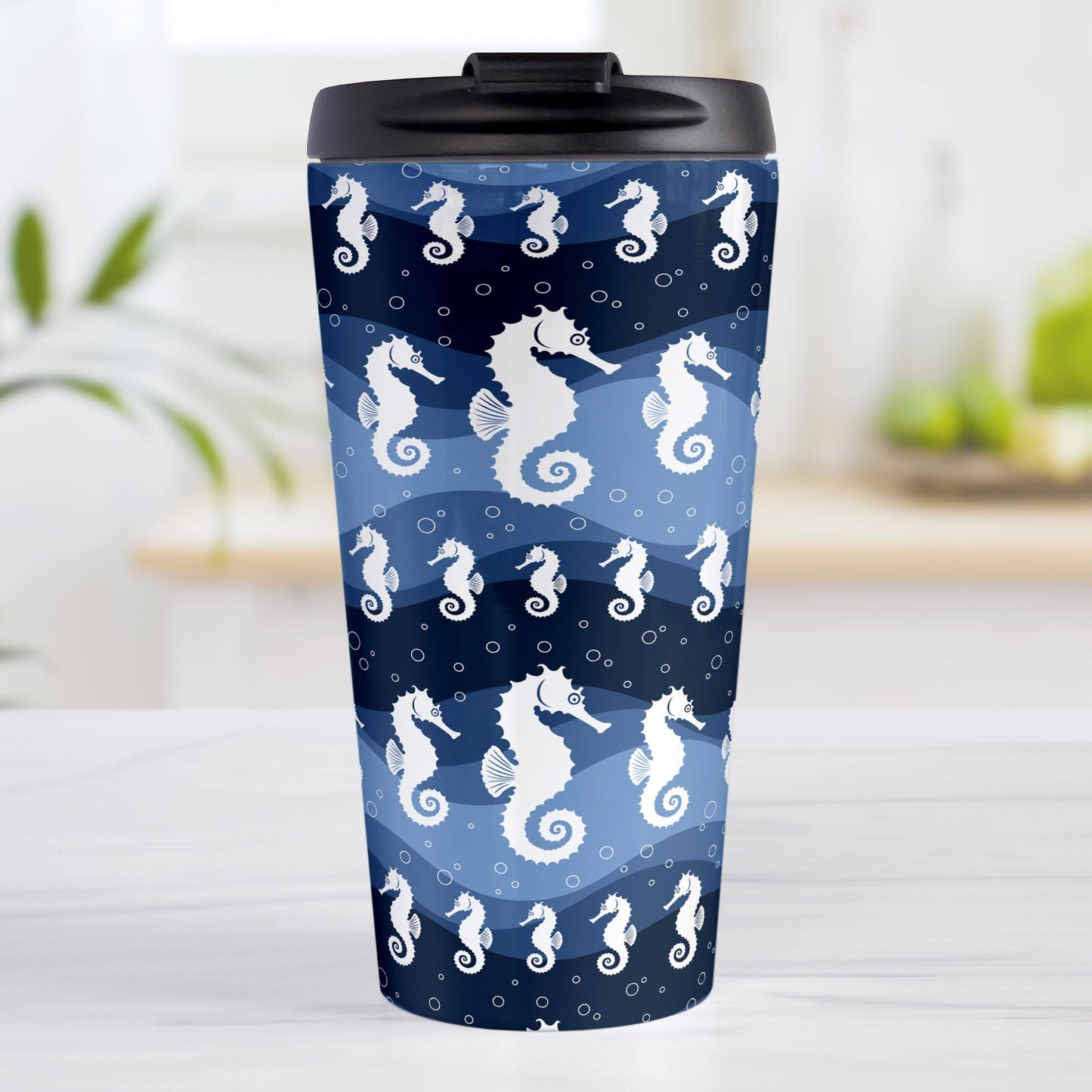 Wavy Blue Seahorse Travel Mug at Amy's Coffee Mugs. A 15oz travel mug designed with white silhouette seahorses over a wavy blue background in different shades of navy blue with white circle line bubbles all in a pattern that wraps around the travel mug.