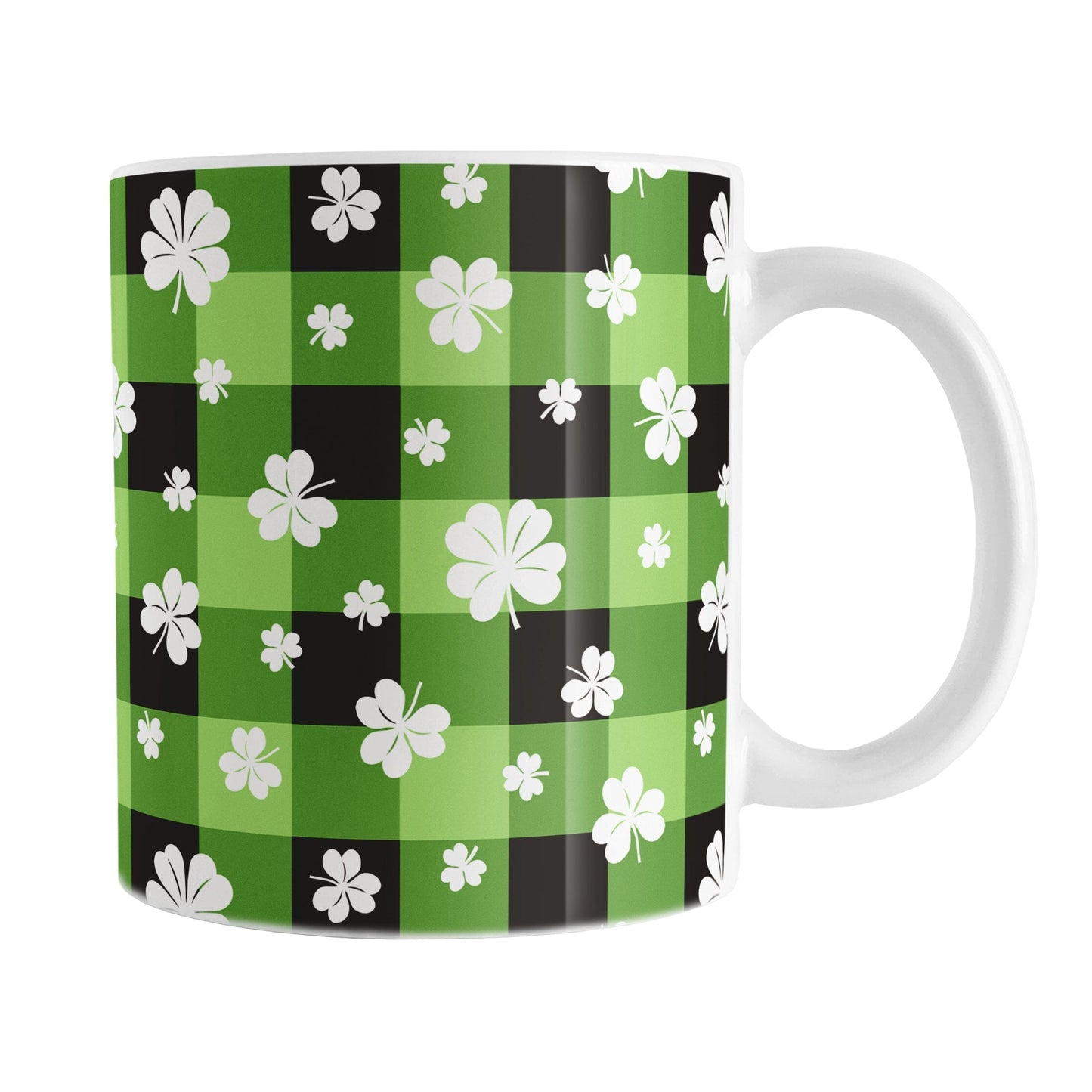 11oz mug with green and black checkered (buffalo plaid) pattern and white shamrocks and four-leaf clovers