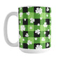 15oz mug with green and black checkered (buffalo plaid) pattern and white shamrocks and four-leaf clovers