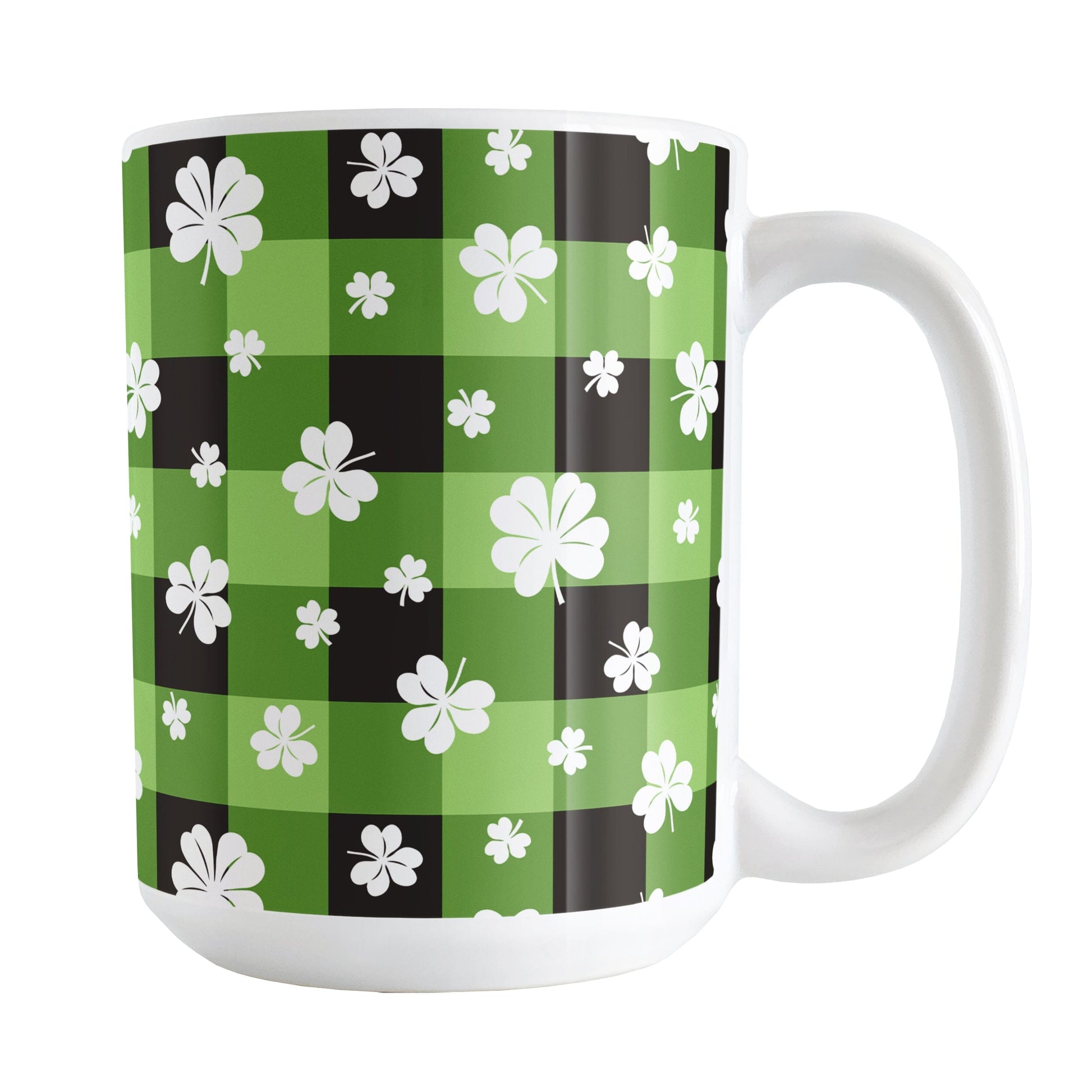 15oz mug with green and black checkered (buffalo plaid) pattern and white shamrocks and four-leaf clovers