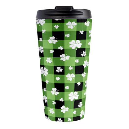 15oz travel mug with green and black checkered (buffalo plaid) pattern and white clovers