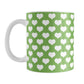 White Hearts Pattern Green Mug (11oz) at Amy's Coffee Mugs. A ceramic coffee mug designed with a pattern of big white hearts over a green background color that wraps around the mug to the handle. It's the perfect mug for anyone who loves hearts and the color green.