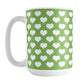White Hearts Pattern Green Mug (15oz) at Amy's Coffee Mugs. A ceramic coffee mug designed with a pattern of big white hearts over a green background color that wraps around the mug to the handle. It's the perfect mug for anyone who loves hearts and the color green.