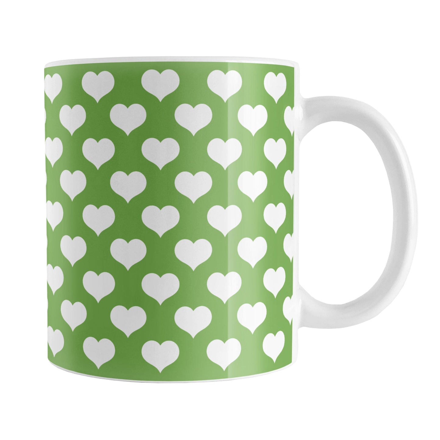 White Hearts Pattern Green Mug (11oz) at Amy's Coffee Mugs. A ceramic coffee mug designed with a pattern of big white hearts over a green background color that wraps around the mug to the handle. It's the perfect mug for anyone who loves hearts and the color green.