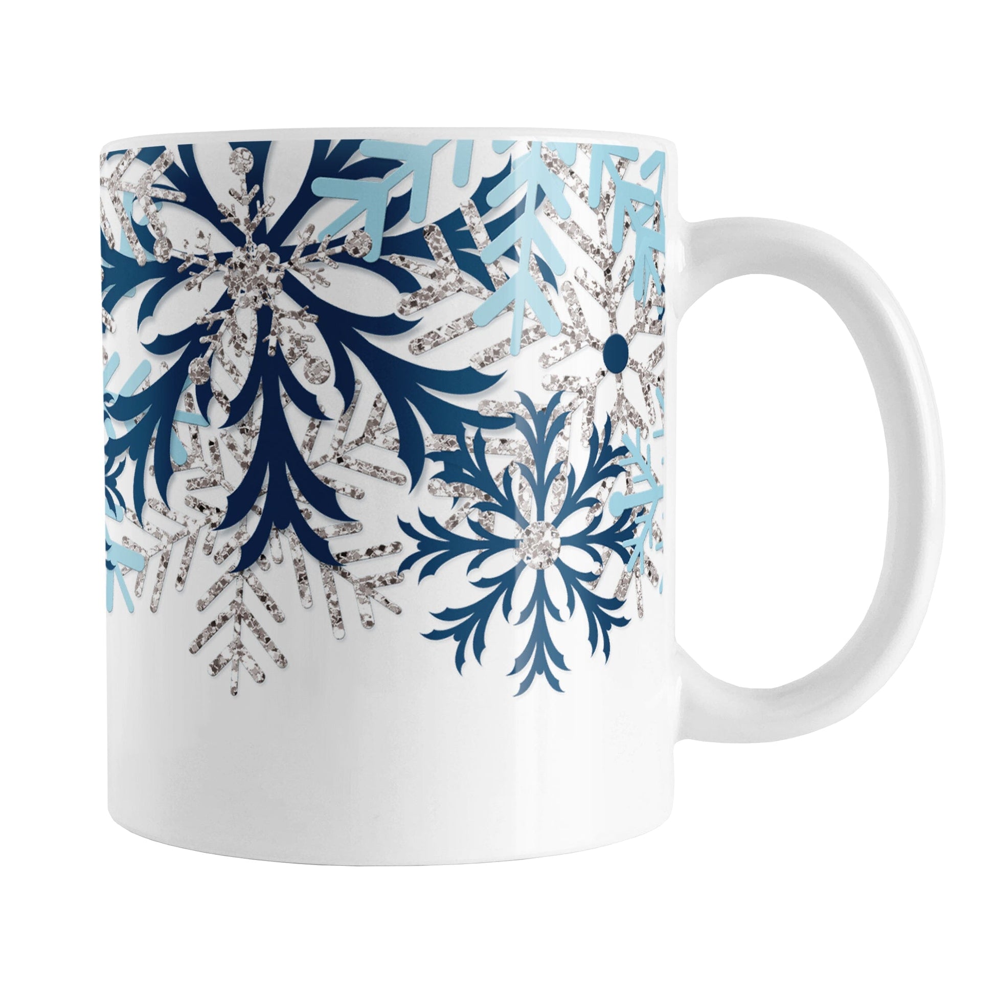 Winter Blue Silver Snowflake Mug (11oz) at Amy's Coffee Mugs. A ceramic coffee mug with navy blue, aqua blue, and silver-colored glitter-illustrated snowflakes along the top, cascading down most of the mug, over white. This wintry snowflake design wraps around the mug up to the handle.