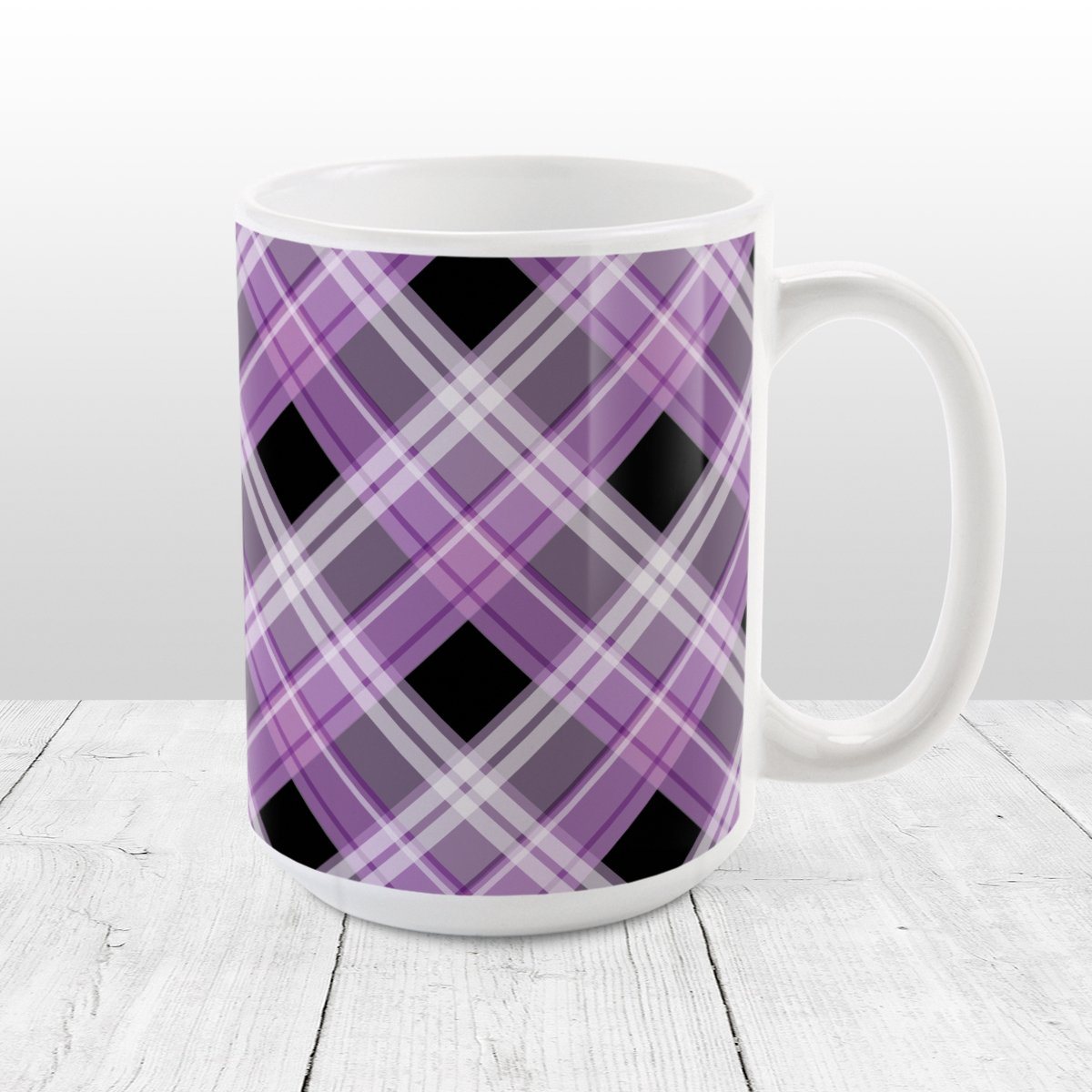Alternative Purple Plaid Mug (15oz) at Amy's Coffee Mugs. A ceramic coffee mug designed with a diagonal purple, black, and white plaid pattern that wraps around the mug to the handle. Designed for someone who loves plaid patterns and the colors purple and black.