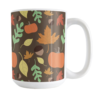 Autumn Pumpkins and Leaves Pattern - Fall Mug (15oz) at Amy's Coffee Mugs. A ceramic coffee mug designed with a pattern of pumpkins, acorns, and leaves in orange, yellow, and green over a brown background color that wraps around the mug up to the handle.