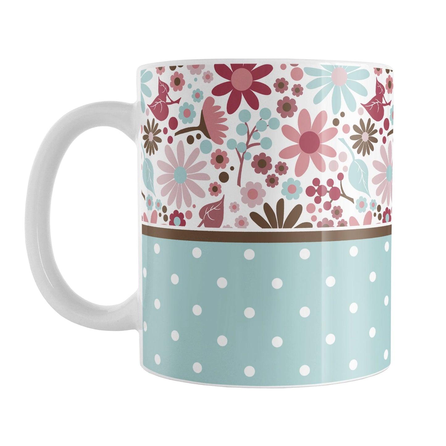 Berry Blue Summer Flowers Polka Dot Mug (11oz) at Amy's Coffee Mugs. A ceramic coffee mug designed with a pretty floral pattern in a gorgeous berry pink color palette, with light blue and brown along the top, and a light blue polka dot pattern along the bottom. These patterns wrap around the mug to the handle.
